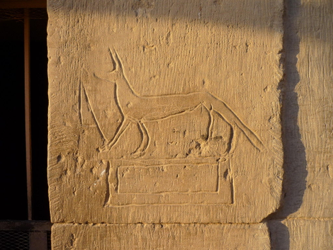 Ancient graffiti at Kom Ombo Temple in Egypt, and modern graffiti in the same country by members of Anonymous